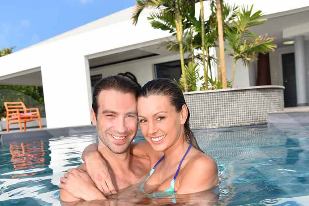 couple enjoying private pool