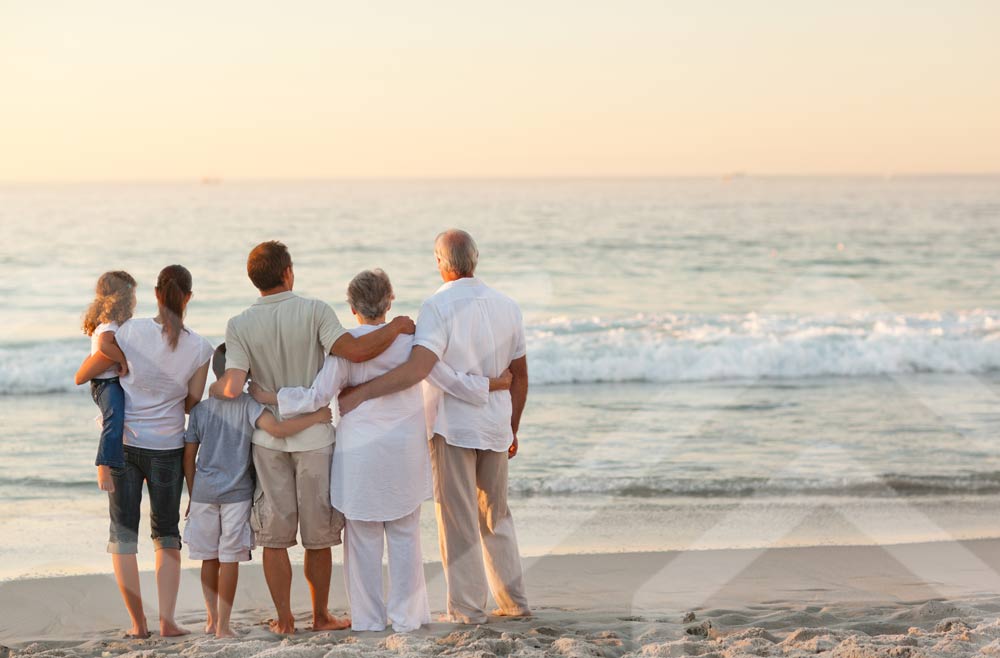 family sunset at the beach
