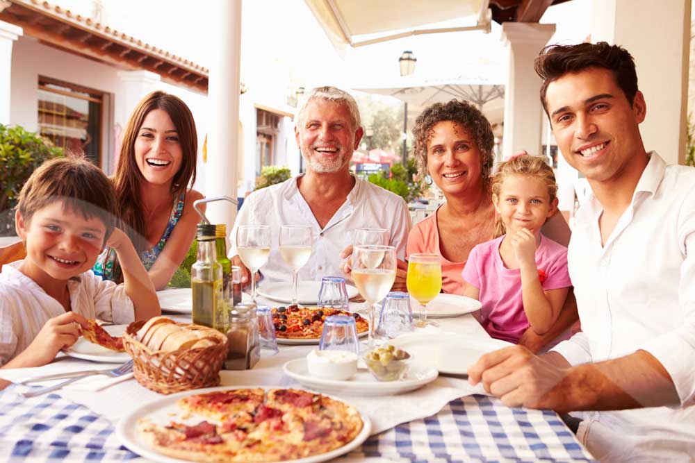 family having dinner summer